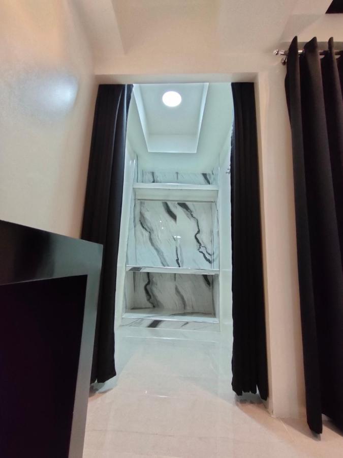 Burgundy Mckinley Place Service Apartment Μανίλα Εξωτερικό φωτογραφία